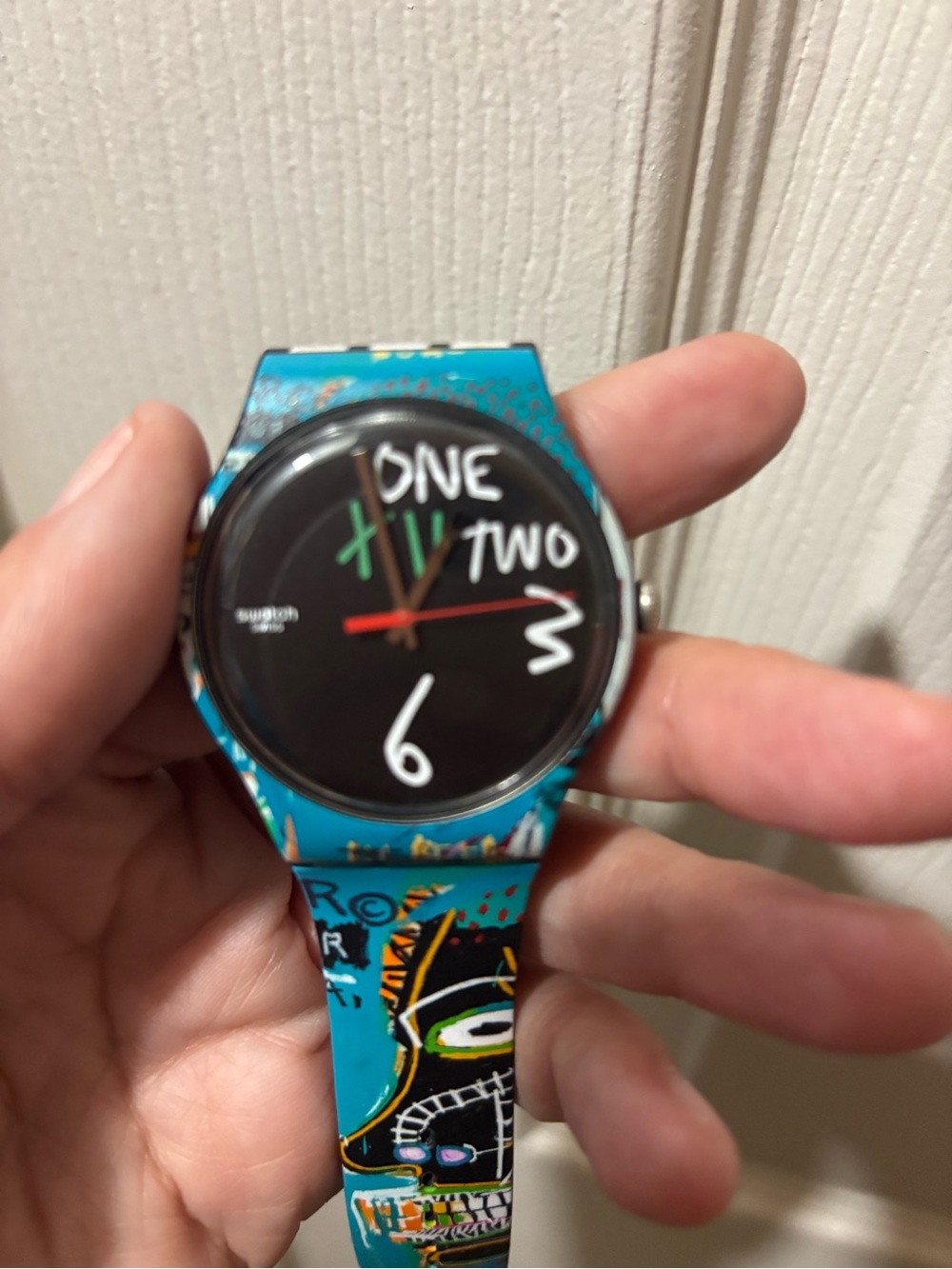 Swatch Turquoise Graphic Strap Black Dial Watch with Multicolored Hands